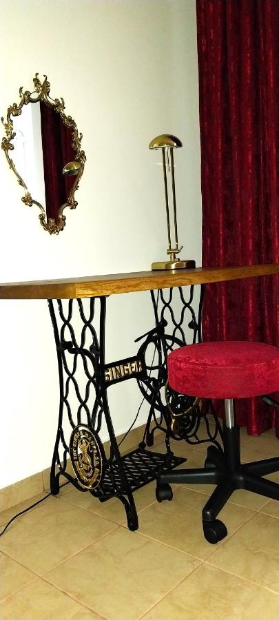 The bedroom table, with a red stool