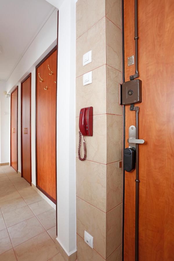 The apartment's front door, with intercom